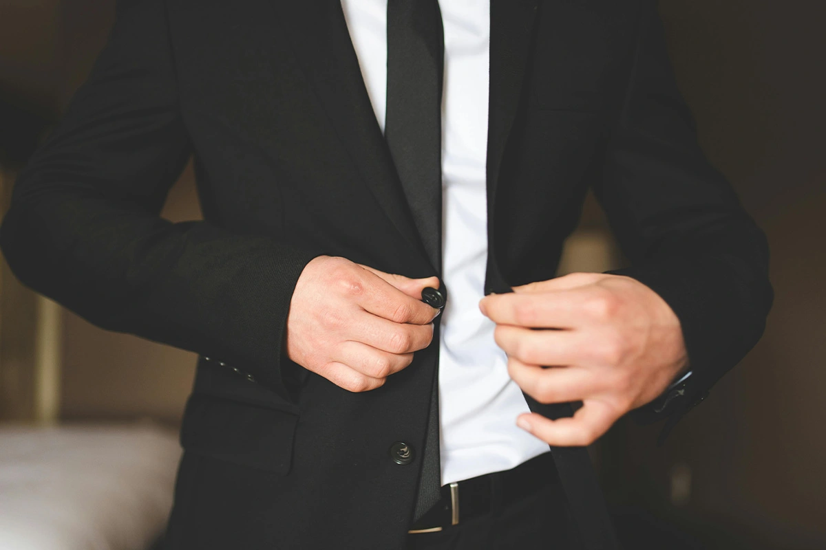 Customer wearing custom suit after fitting in Bangkok